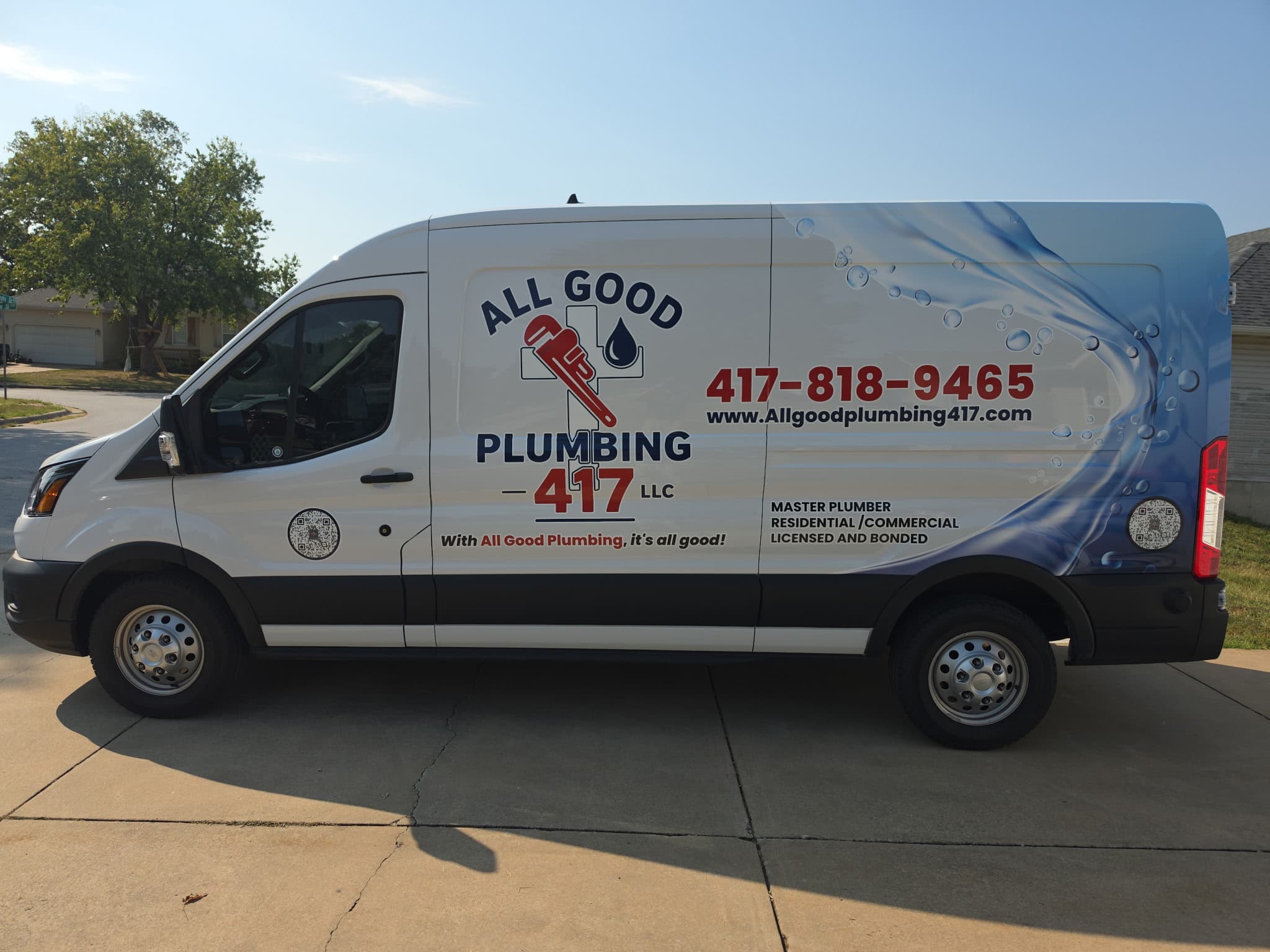 White All Good Plumbing 417 LLC work van with the navy-and-red wrap: wrench-and-cross mark, phone 417-818-9465, website, Master Plumber credentials, and the line With All Good Plumbing, it's all good!